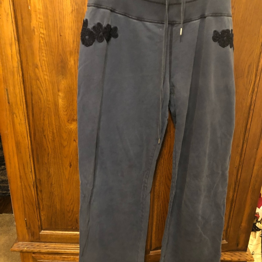Womens Lucky Brand navy sweatpants with embroidery on the sides in size large.